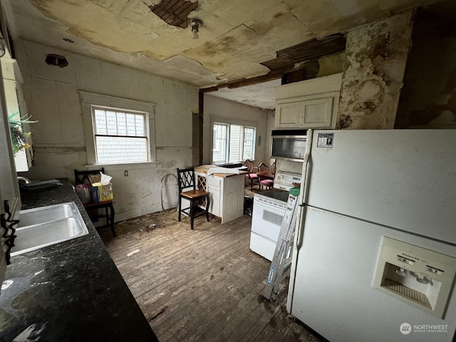 1223E 2nd St, Aberdeen, WA 98520 - kitchen with white appliances, dark wood-style flooring, and a sink