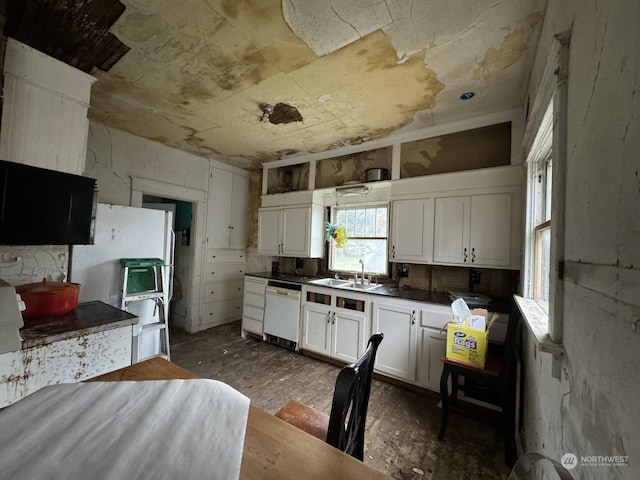 1223E 2nd St, Aberdeen, WA 98520 - kitchen with a sink, white cabinetry, dishwasher, open shelves, and dark countertops