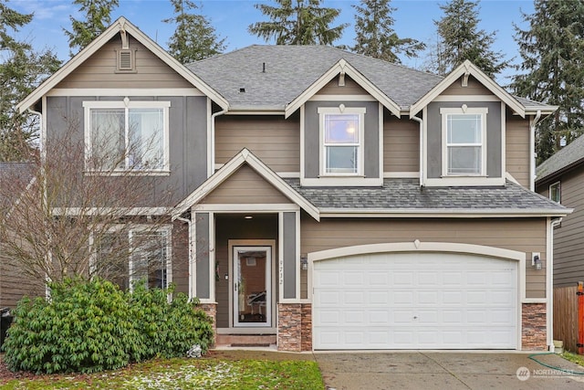 craftsman-style house featuring a garage