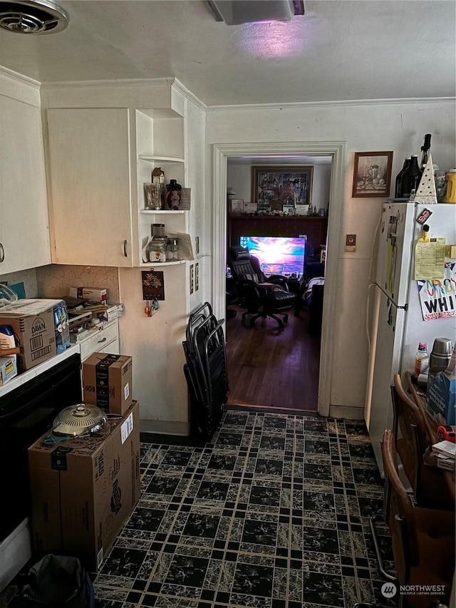 interior space with white fridge