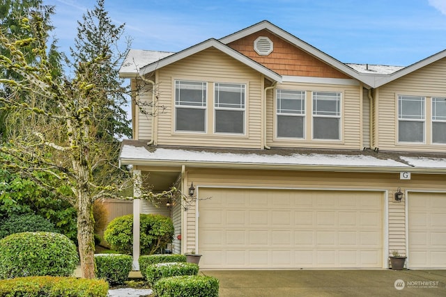 view of front of property with a garage