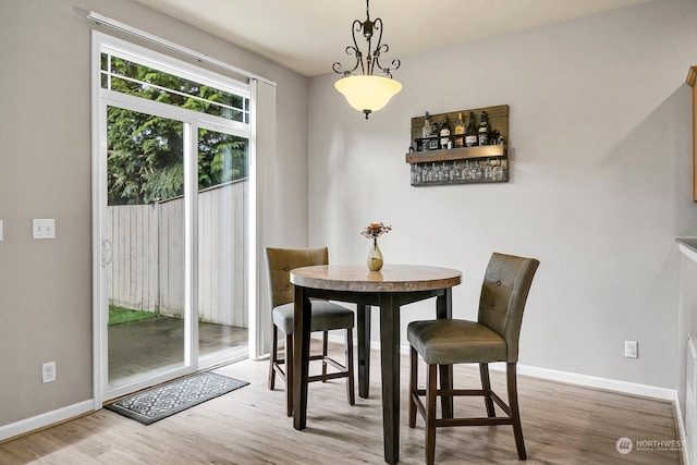 dining room with light hardwood / wood-style floors