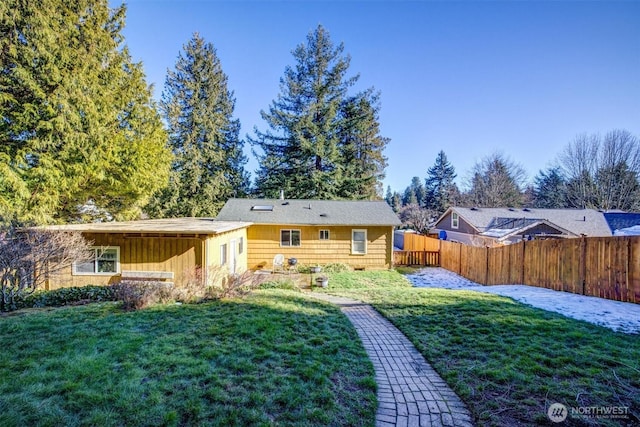 17017 10th Ave NE, Shoreline, WA 98155 - back of property with a lawn and fence