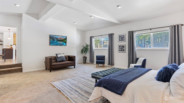 bedroom featuring vaulted ceiling with beams and light colored carpet