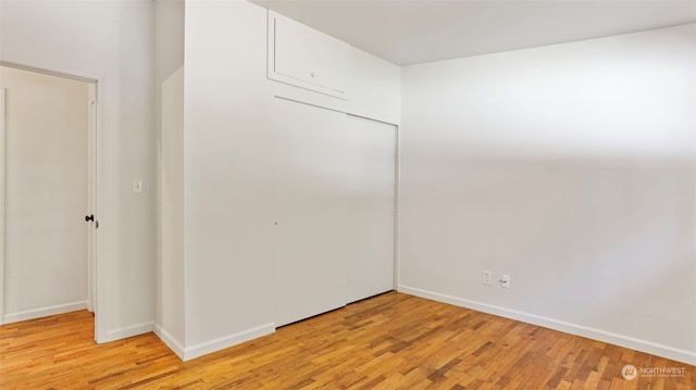 empty room with light wood-type flooring