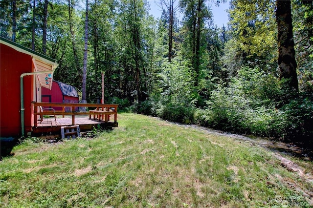 view of yard with a deck