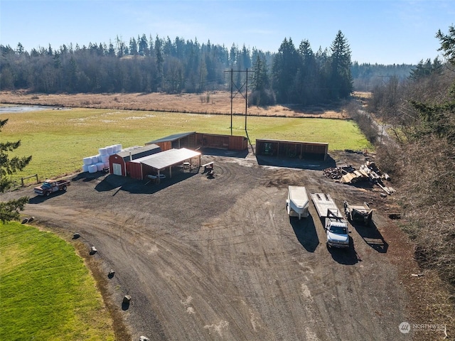 birds eye view of property featuring a rural view