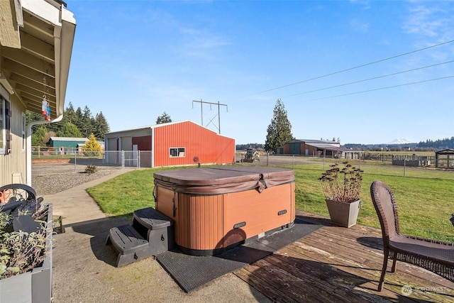 exterior space with a wooden deck and a hot tub