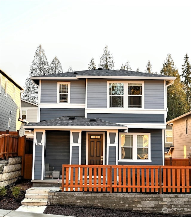 front facade featuring covered porch