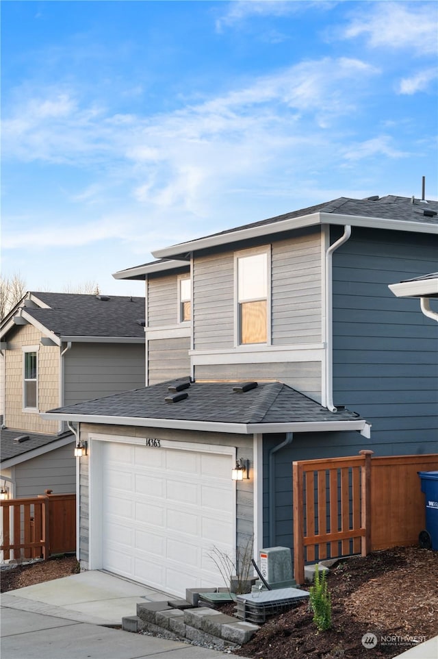 view of front of property featuring a garage