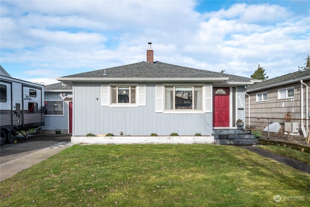 view of front of home with a front lawn