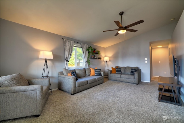 carpeted living room featuring ceiling fan and vaulted ceiling