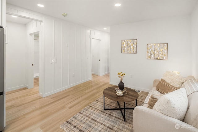 living room with light hardwood / wood-style floors