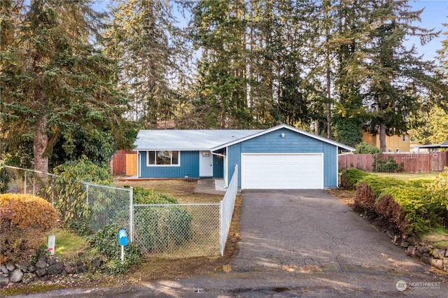 single story home with a garage