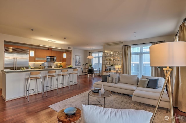 living room with light hardwood / wood-style floors