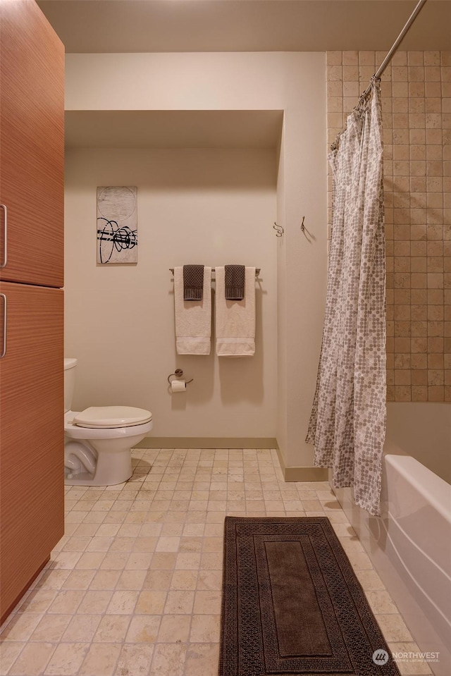 bathroom featuring toilet