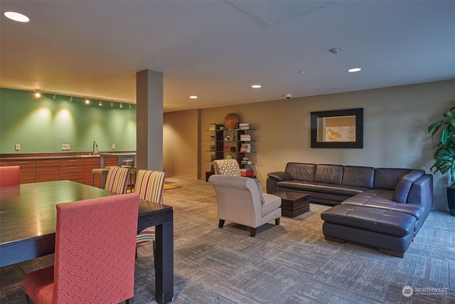 living room featuring carpet flooring and indoor wet bar