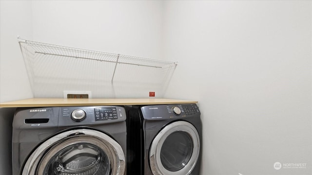 washroom featuring independent washer and dryer