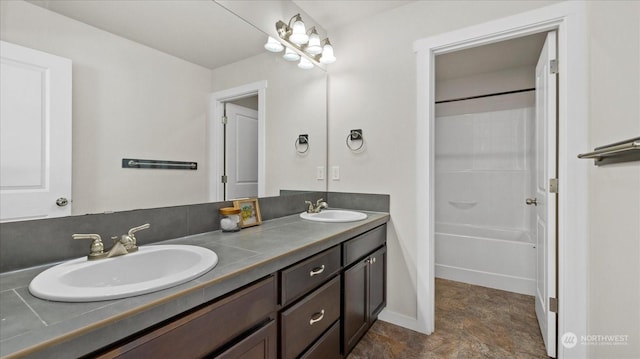 bathroom with vanity and shower / bathtub combination