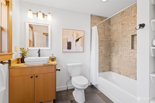 full bathroom with vanity, toilet, and shower / bath combo with shower curtain