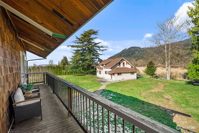 balcony featuring a mountain view