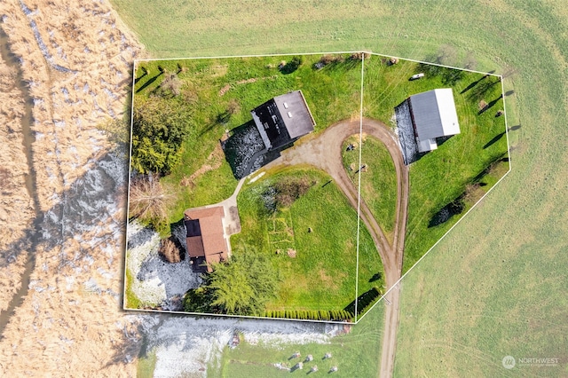 birds eye view of property featuring a rural view