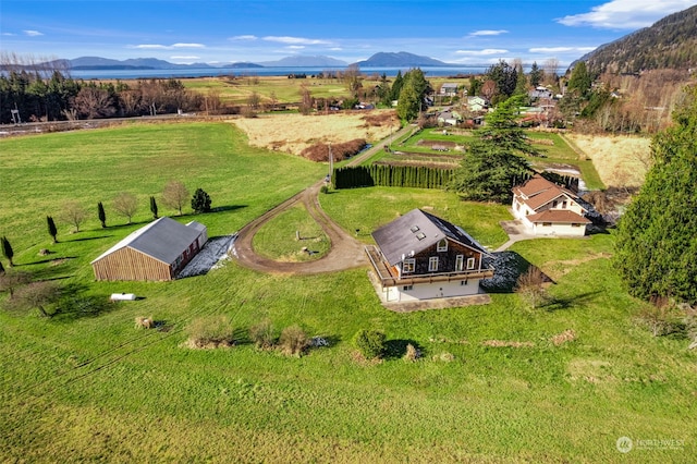 bird's eye view with a rural view and a mountain view