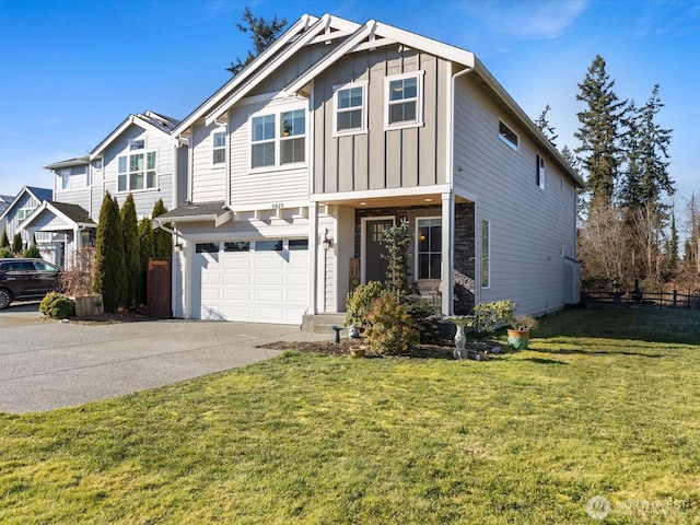 view of front of house with a garage and a front lawn