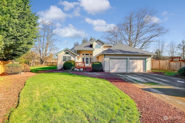 view of front of home featuring a garage and a front yard