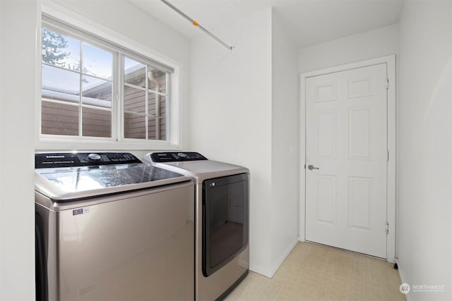 laundry room with washer and dryer