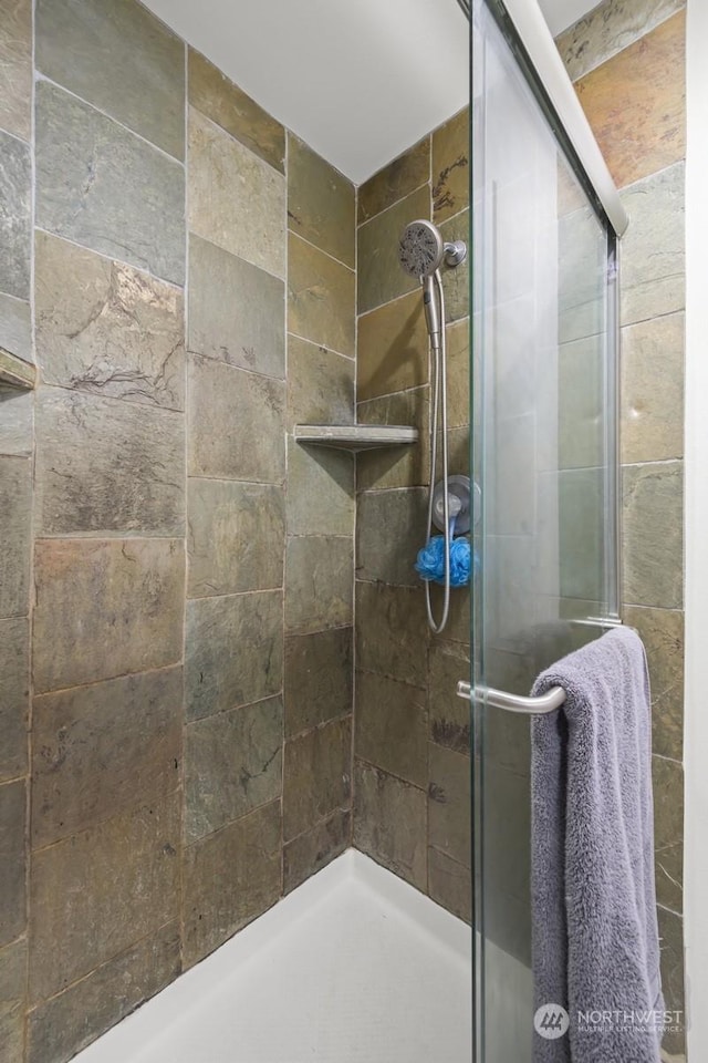 bathroom with walk in shower