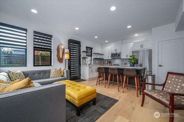 living room with light hardwood / wood-style floors