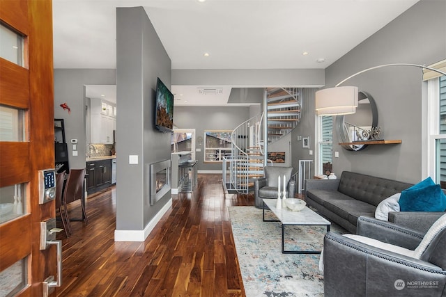 living room featuring dark hardwood / wood-style floors