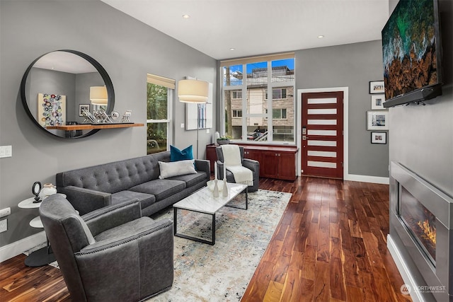 living room featuring dark hardwood / wood-style floors