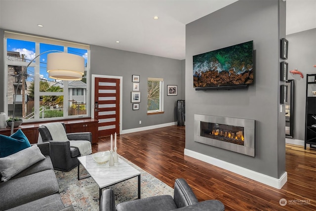 living room with dark wood-type flooring