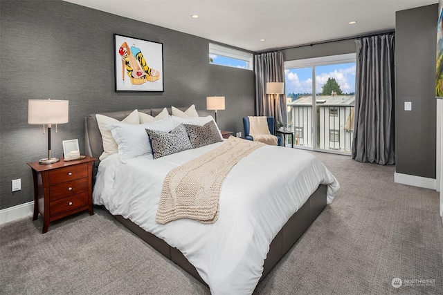 bedroom featuring carpet and access to outside