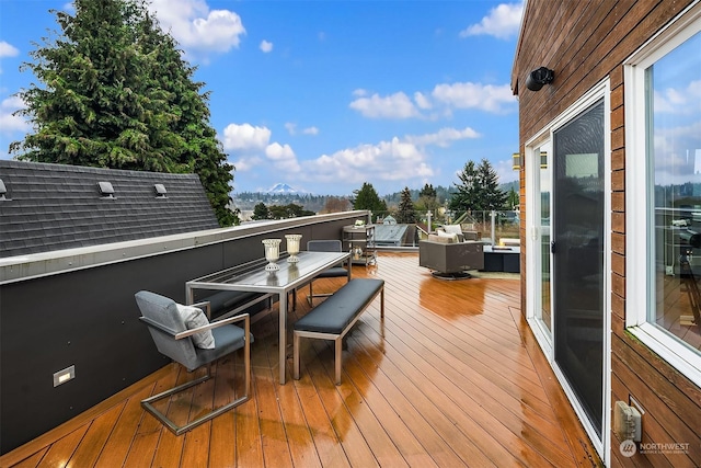 deck featuring an outdoor living space