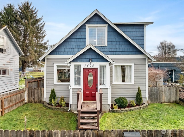 view of front of house with a front lawn