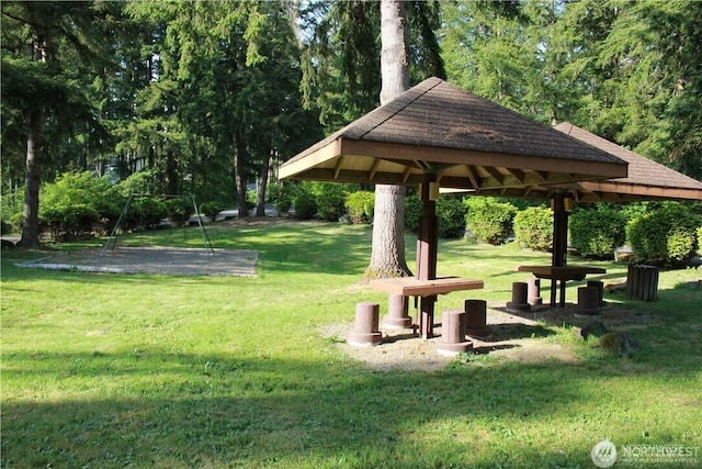 view of community with a gazebo and a lawn