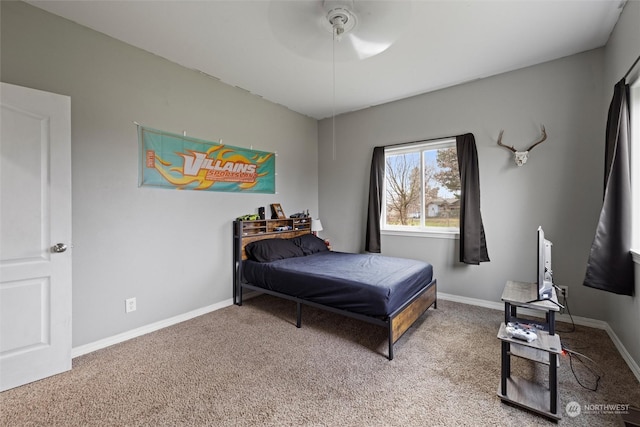 bedroom with ceiling fan and carpet floors