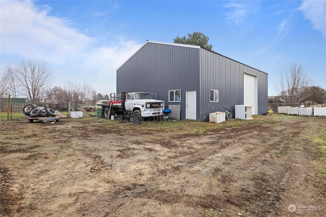 view of outdoor structure with a garage