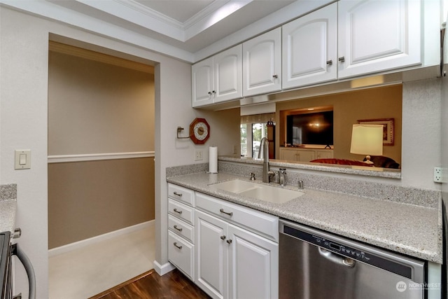 kitchen with sink, white cabinetry, ornamental molding, dark hardwood / wood-style flooring, and stainless steel dishwasher