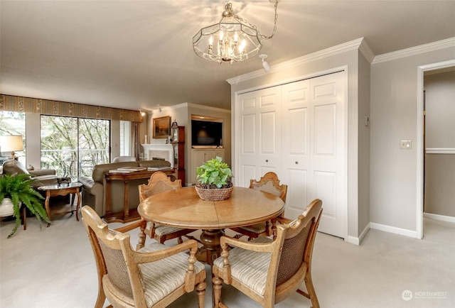 dining area with an inviting chandelier, ornamental molding, and light carpet