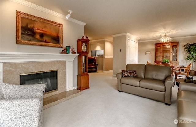 carpeted living room featuring crown molding and a fireplace