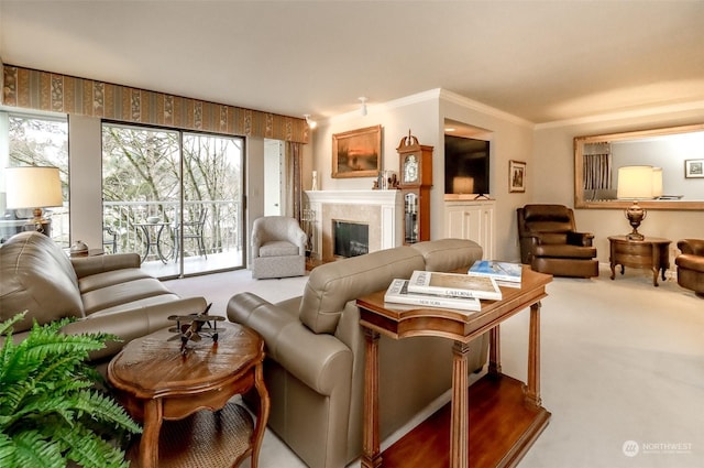 carpeted living room with ornamental molding