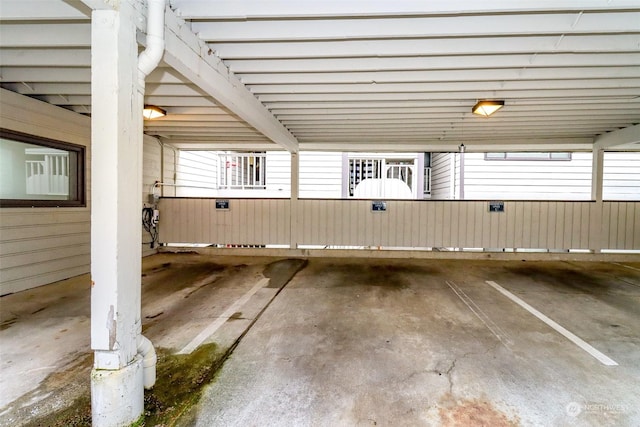 exterior space with a carport