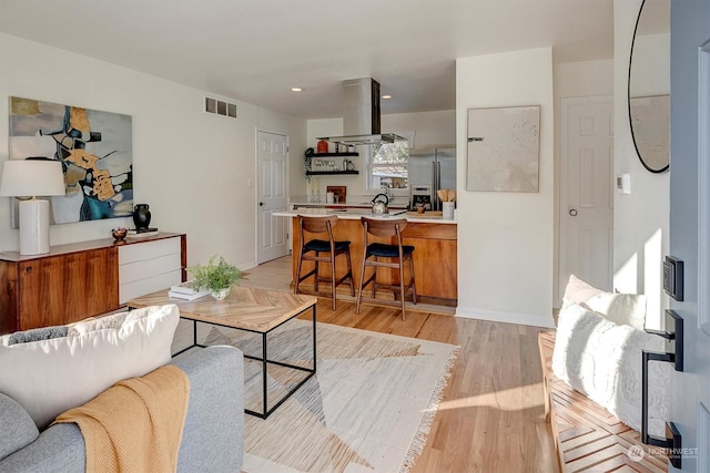 living room featuring light hardwood / wood-style floors