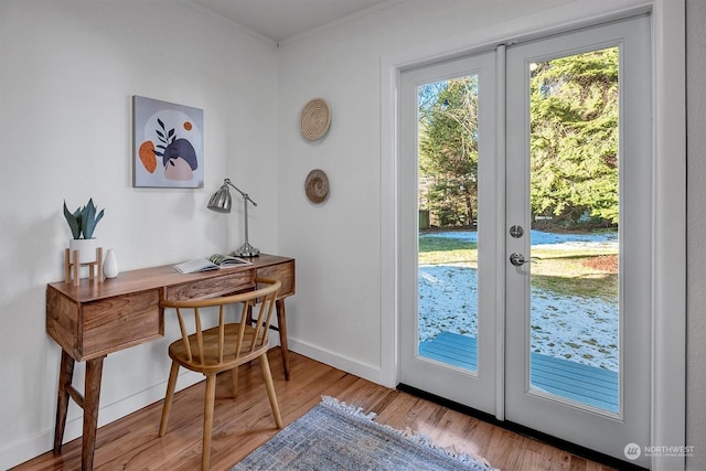 doorway featuring hardwood / wood-style flooring and french doors