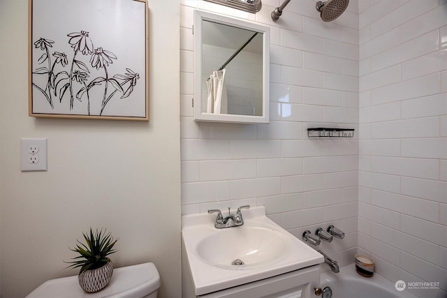 full bathroom with vanity, shower / tub combo with curtain, and toilet