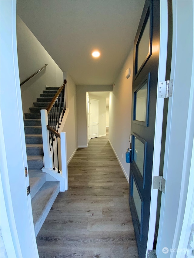 hallway featuring hardwood / wood-style floors